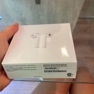 NWT Apple AirPods with charging case